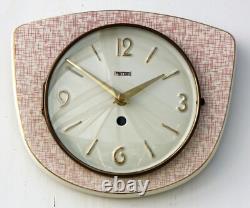 Horloge murale Peter vintage en céramique rétro atomique de 25 cm rose allemande des années 50