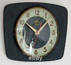 Horloge murale vintage Japy Formica de 25 cm, rétro français du milieu du siècle, en bois atomique