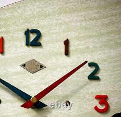 Horloge murale vintage Jura 33 cm en formica français style rétro mi-siècle atomique