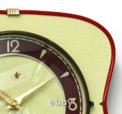 Horloge murale vintage jaune de 25 cm, forme REG française, Formica rétro, milieu de siècle, atomique