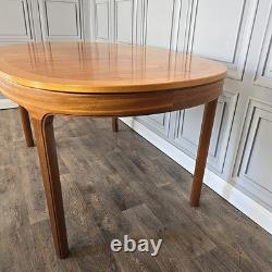 Table à manger extensible rétro vintage Nathan en teck du milieu du siècle, MCM en bois.